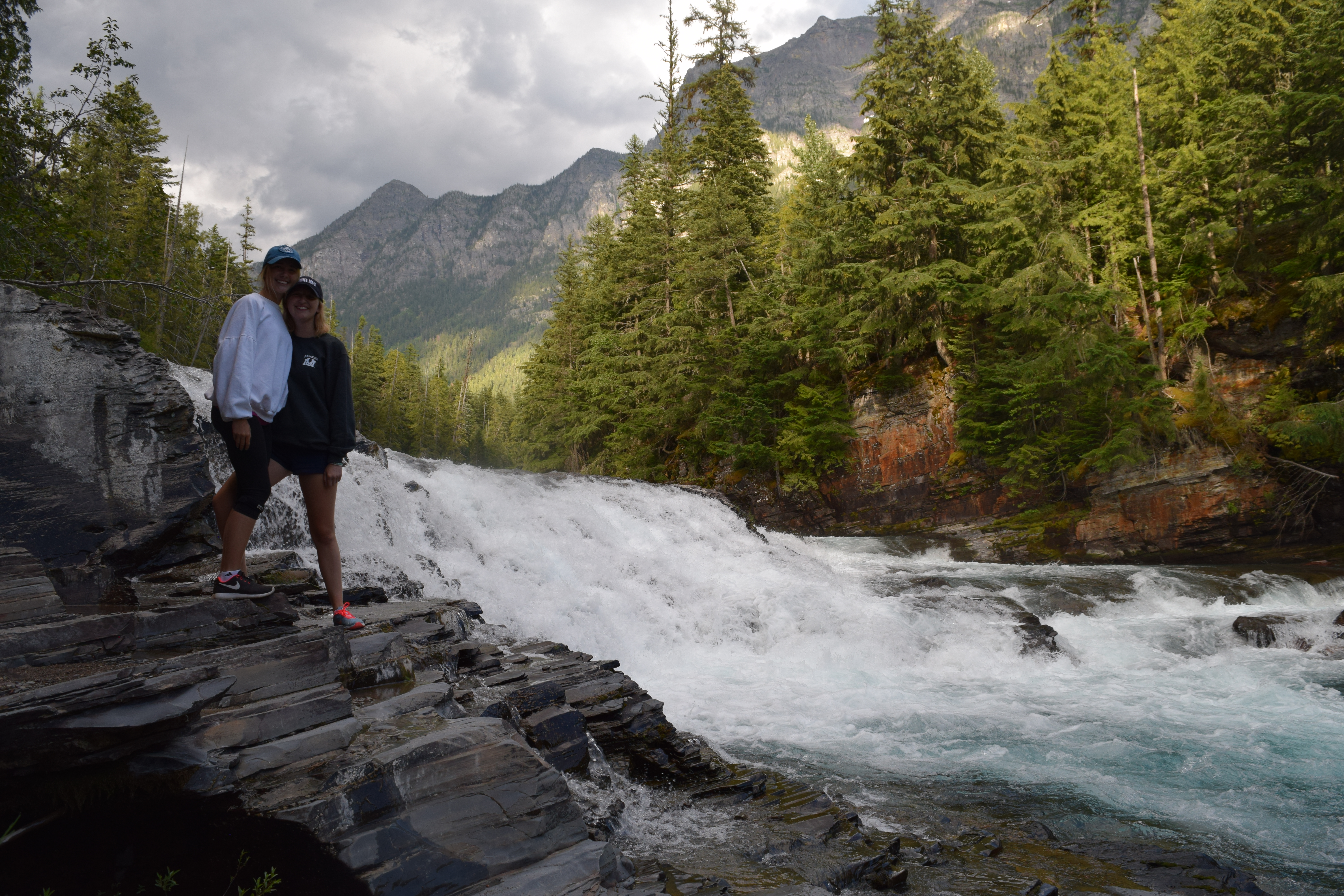 Two girls on a Waterfall Hike Glacier National Park